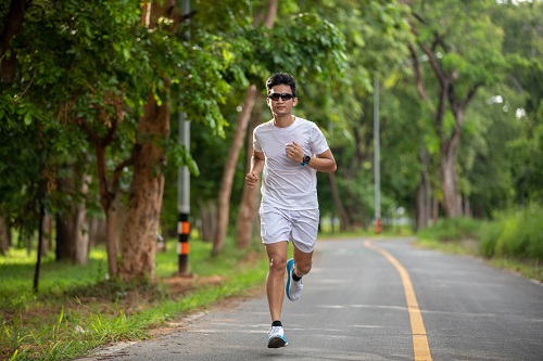 Asian men jogging and running in the park